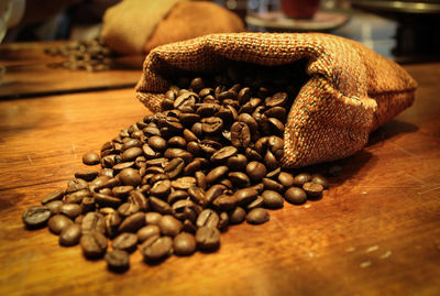 Close-up of coffee beans on table