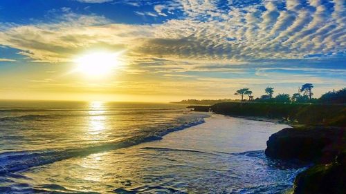 Scenic view of sea against sky at sunset