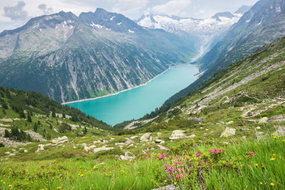 Turquoise colored lake and glacier in the alps