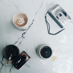 High angle view of coffee cup on table