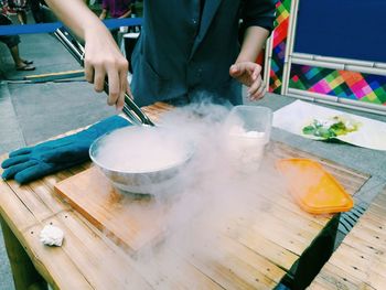 Close-up of person preparing food