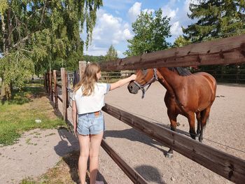 Full length of girl in a horse