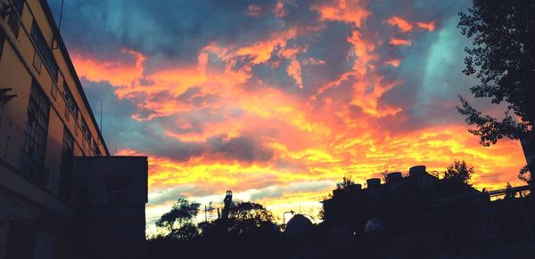 Low angle view of cloudy sky at sunset