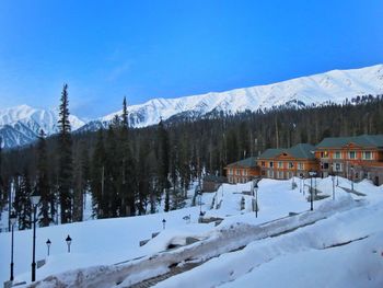 Scenic view of mountains against cloudy sky