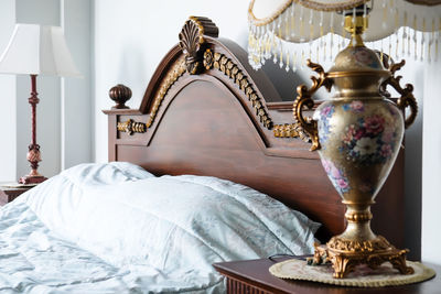 Detail image of antique luxury bed and furnitures, bed room interior design and decor