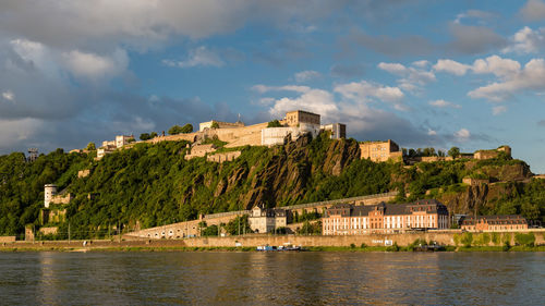 Panoramic view of the ehrenbreitstein fortress on the side of river rhine in koblenz, germany.