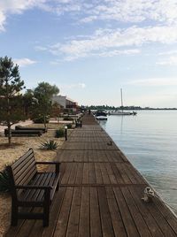 Pier over sea against sky