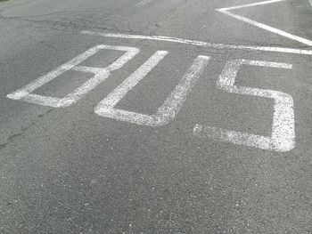 High angle view of text on road