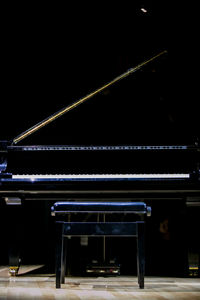 View of piano keys at night