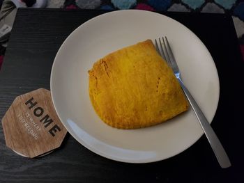 Close-up of bread in plate on table