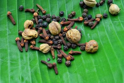 Dried spice mix on green banana leaves