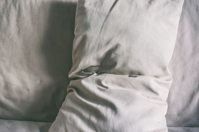 High angle view of pillows on bed