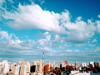 Panoramic view of buildings and sea against sky