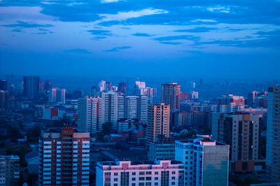 Cityscape against blue sky