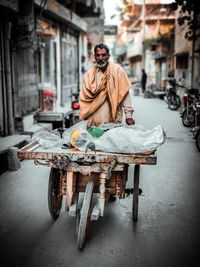 Portrait of man selling scraps