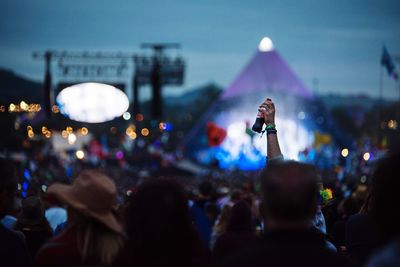 People enjoying at music concert