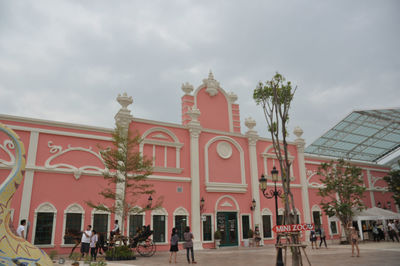 Group of people in front of building