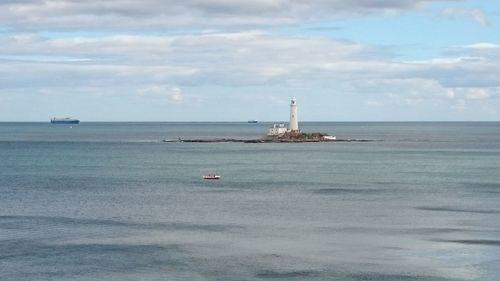 Boat sailing in sea