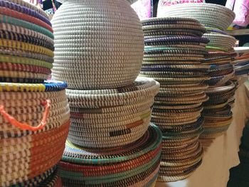 Close-up of multi colored wicker basket for sale in market