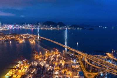 High angle view of illuminated city at night