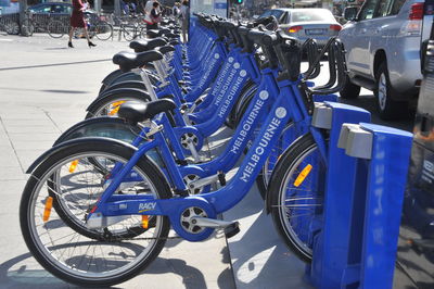 Bicycles parked on street in city