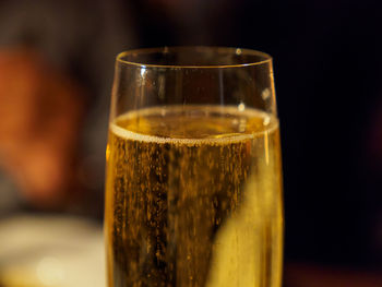 Close-up of beer glass on table