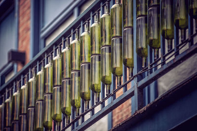 Full frame shot of metal fence by building