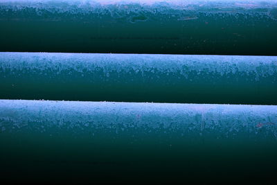 Detail shot of raindrops on blue background