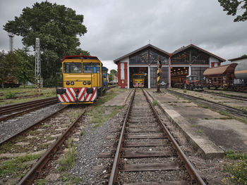 Old historic train depot yellow locomotive