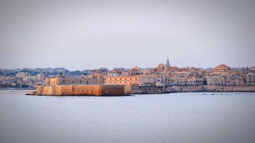 View of buildings at waterfront