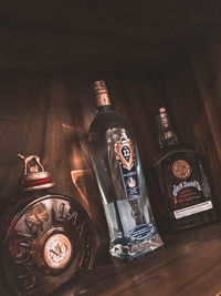High angle view of bottles on table