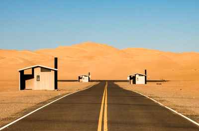 Empty road along desert