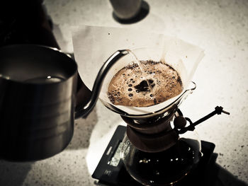 High angle view of coffee cup on table