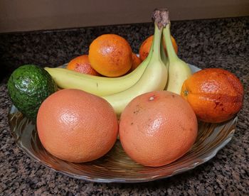 High angle view of fruits in basket on table