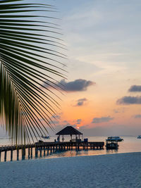 Scenic view of sea against sky at sunset