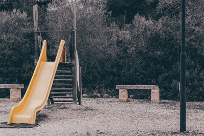 Empty bench in park