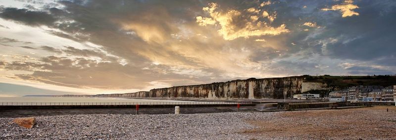 Panoramic view of land against sky during sunset