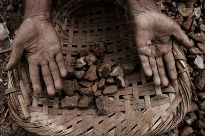 Cropped image of manual worker showing dirty hands