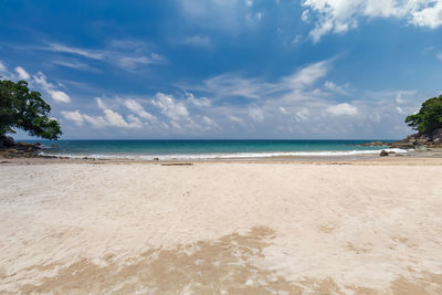 Scenic view of beach against sky