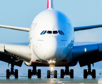 Low angle view of airplane against sky