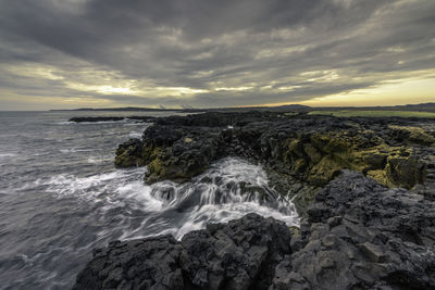 Scenic view of sea against sky during sunset