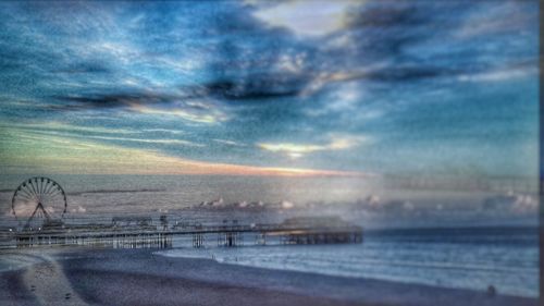 Scenic view of sea against sky at sunset