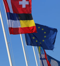 Many international flags and the european flag