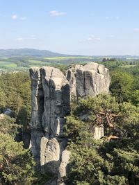 Built structure on landscape against sky