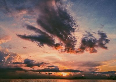 Scenic view of dramatic sky during sunset