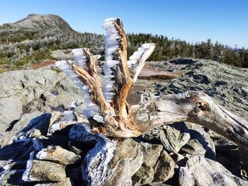 Scenic view of rocky mountains against clear blue sky