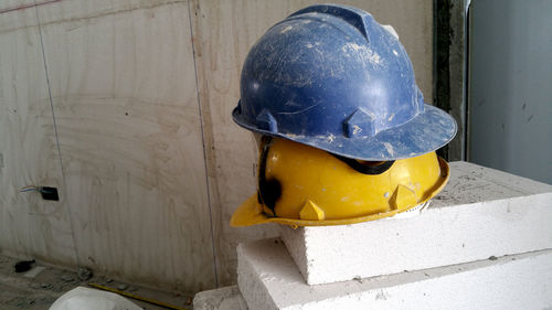 Close-up of hat on wall