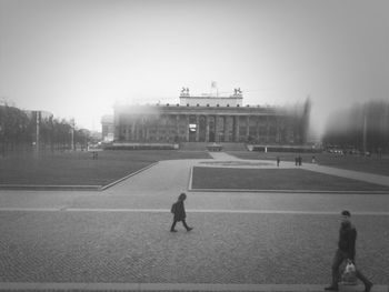 Woman standing in city