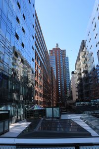 Modern buildings in city against sky