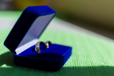 Close-up of blue drinking glasses on table